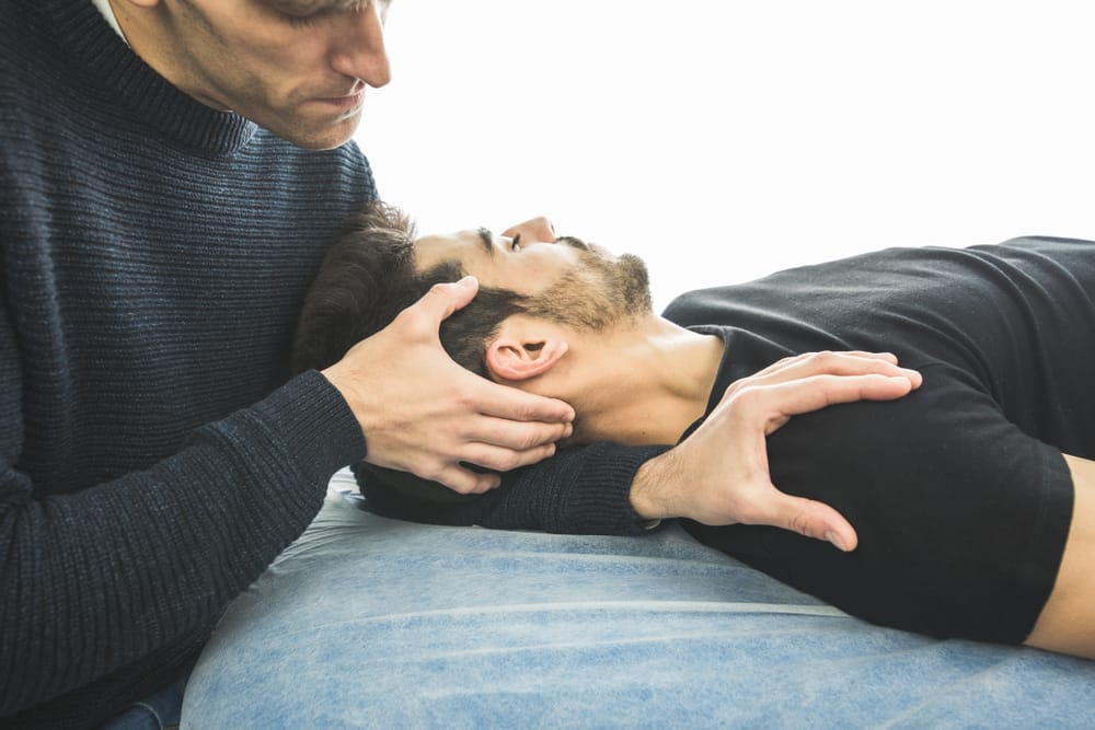 Neck Alignment Therapy - Corrective Exercises A professional therapist assists in neck alignment and mobility improvement to aid recovery and reduce discomfort - Corrective Exercises.